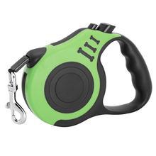 Pet automatic telescopic traction rope in green, featuring one-handed braking and locking system.