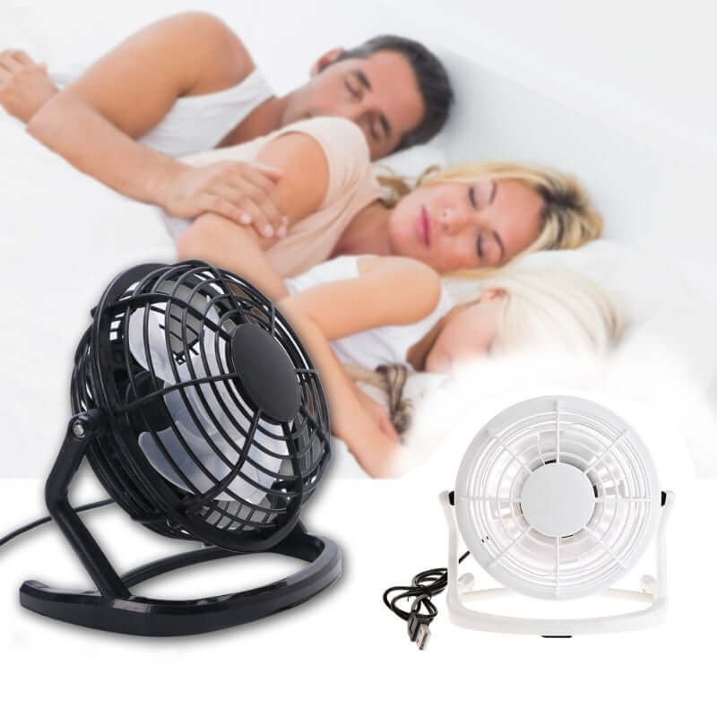 Mini portable ultra-quiet USB desk cooling fans in black and white with family sleeping peacefully in the background.