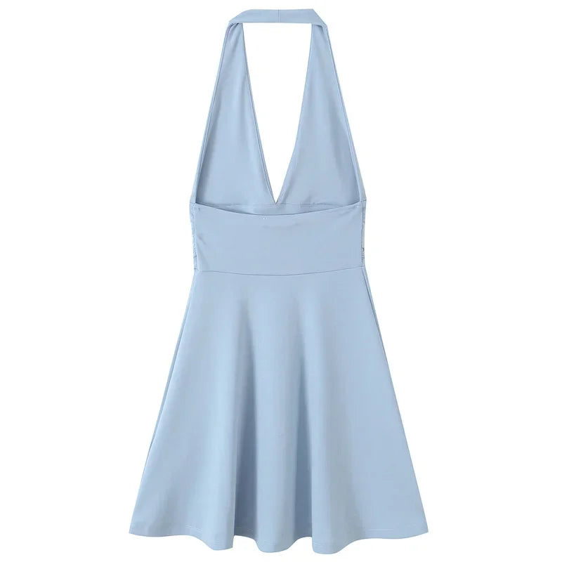 Light blue halter mini dress with a deep V-neck and flared skirt, perfect for summer parties.