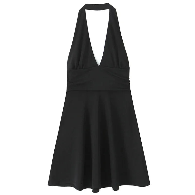 Black halter mini dress for women with backless design, perfect for summer parties and beach outings.