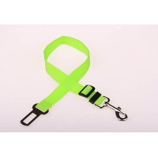 Bright green pet car seat belt leash with durable clip for securing pets during travels.