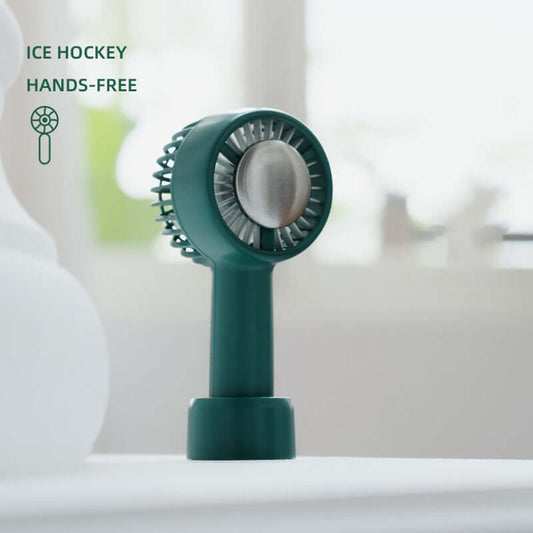 PiKa PiKa Portable USB hockey fan in Cong Lin green with hands-free design, placed on a table.