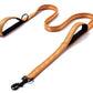 Pet double handle pull leash in orange with soft texture and reflective design for added safety during walks.