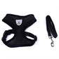 Black mesh pet car seat belt and leash set designed for pet comfort and safety during walks.